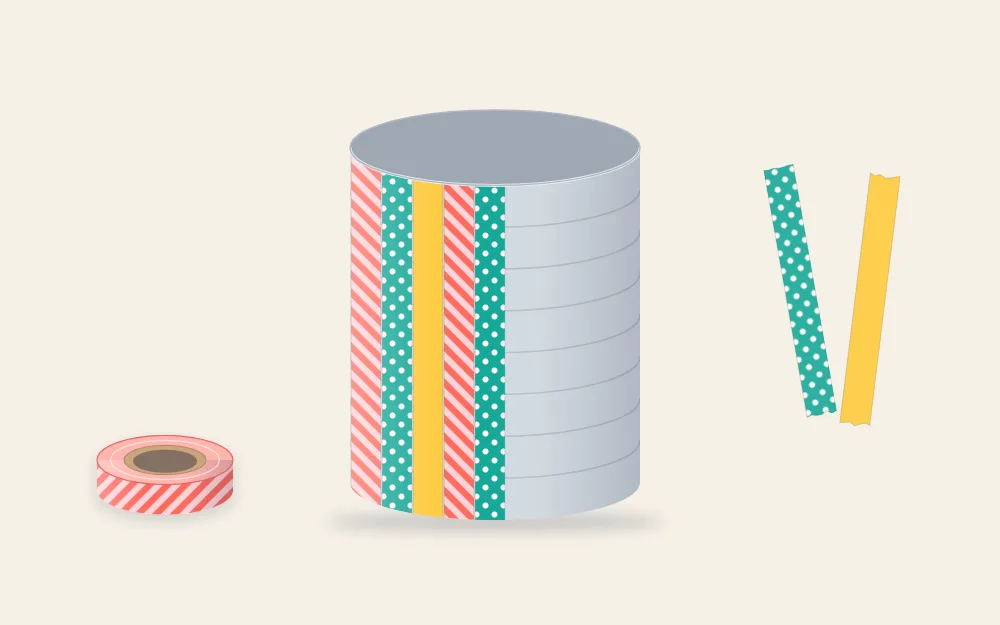 A tin can with vertical washi tape strips covering half of it and bare metal on the rest