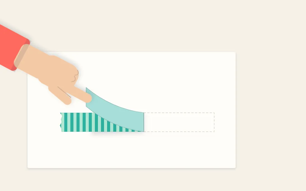 A hand peeling a washi tape strip back slowly at a low angle from a sheet of paper