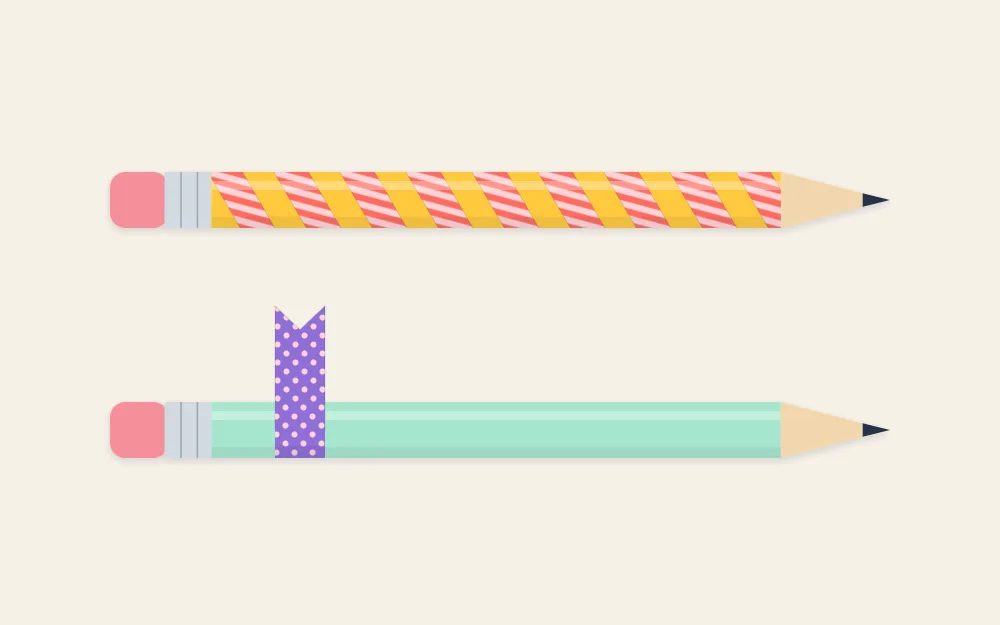 Two pencils, one with a spiral tape wrap and one with a small folded tape flag