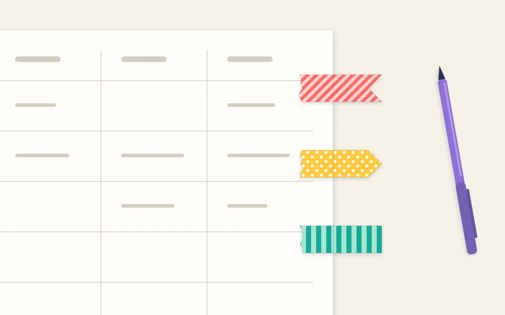 A planner page corner with three small tape deadline flags in different colors at the edge