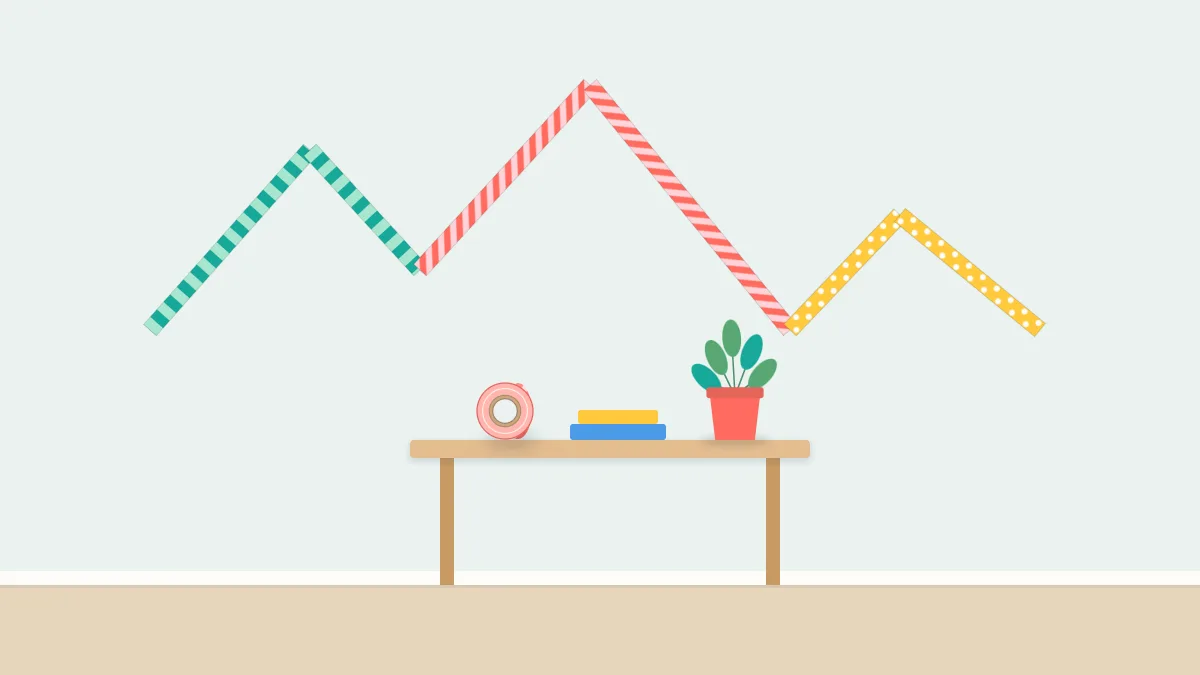 Room wall with a geometric mountain-range outline made from washi tape above a small desk